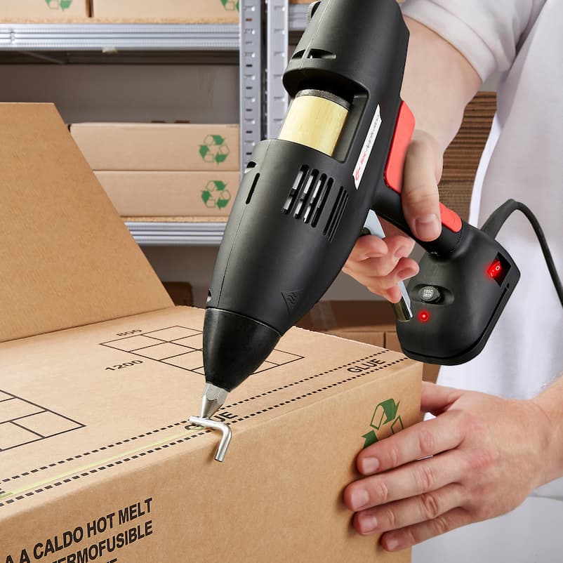 Hot Melt Glue being applied to a box